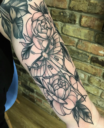 Explore bike tattoo ideas, creative tattoo ideas in Baton Rouge, available at Body Images Tattoo