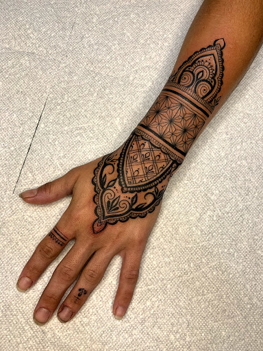 Explore cycle tattoo ideas, creative tattoo ideas in Asheville, available at Spirit Alchemy Tattoo