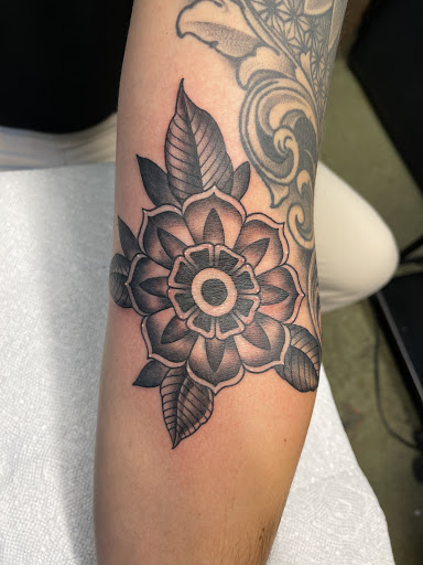 Explore tattoo ideas for family initials, creative tattoo ideas in Dallas, available at Cedar Springs Tattoo & Piercing