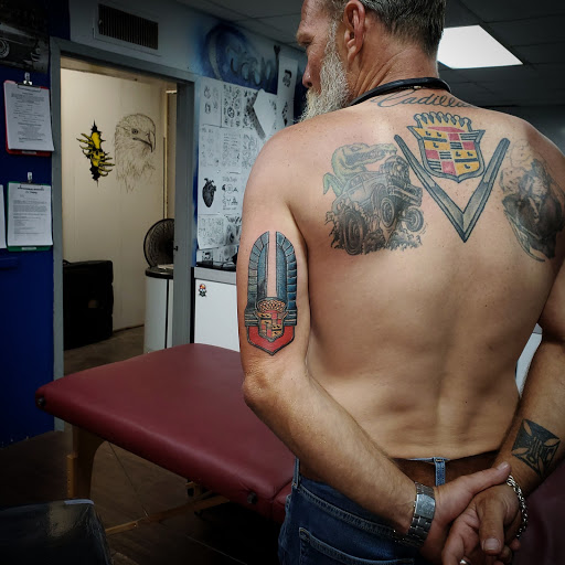 Explore cover up tattoo ideas female leg, creative tattoo ideas in Lubbock, available at Sinners & Saints Art Company