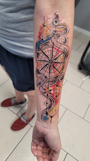 Explore stardust tattoo ideas, creative tattoo ideas in Ocoee, available at Slaughterized Ink Tattoo and Piercing Studio