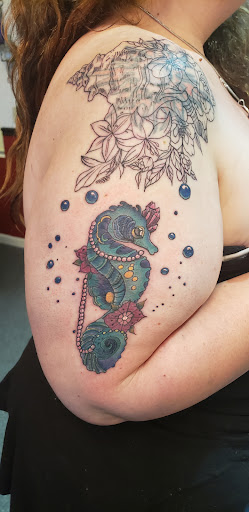 Explore lip tattoo ideas, creative tattoo ideas in Cornelia, available at Prismatic Pulse Tattoo
