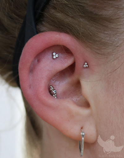 Explore 1996 tattoo ideas, creative tattoo ideas in Syracuse, available at Scarab Body Arts