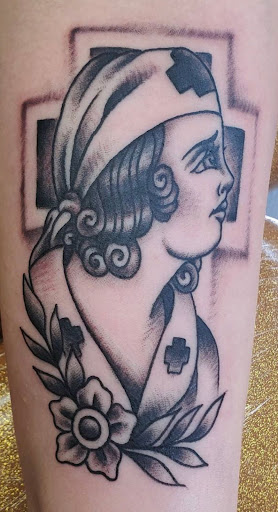 Explore chest tattoo ideas men, creative tattoo ideas in Mchenry, available at Lunchbox Tattoo and Body Piercing
