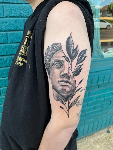 Explore black heart tattoo ideas, creative tattoo ideas in Sioux Falls, available at Moon Rae Tattoo