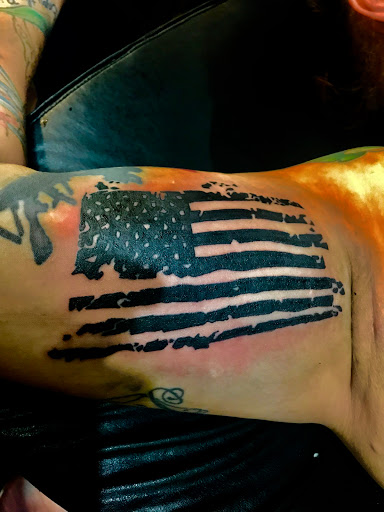 Explore red cardinal tattoo ideas, creative tattoo ideas in Kennewick, available at Luxurious Life Tattoo