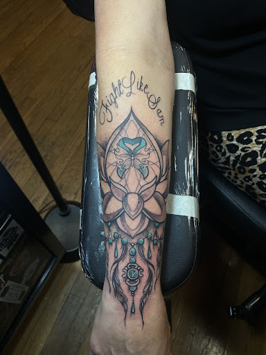 Explore gangster tattoo ideas for men, creative tattoo ideas in Canton, available at The Inkeepers Tattoo Parlor