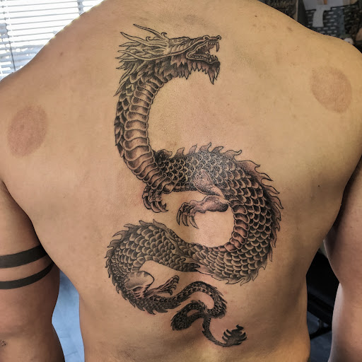 Explore spiral tattoo ideas, creative tattoo ideas in Ventura, available at Famous Tattoo & Body Piercing