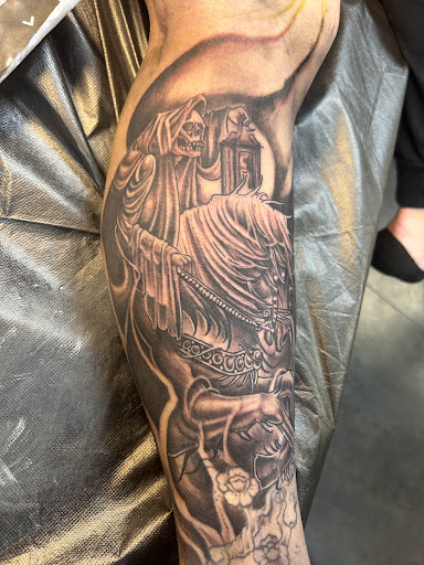 Explore big cover up tattoo ideas, creative tattoo ideas in Las Vegas, available at Work of Art Tattoo and Piercing