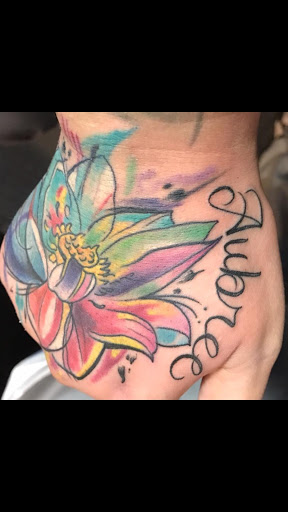 Explore hand tattoos ideas for men, creative tattoo ideas in Rockford, available at Euro Tattoo