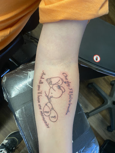 Explore glitter tattoo ideas, creative tattoo ideas in Midvale, available at Dark Arts Tattoo & Dark Mark Piercing Studio