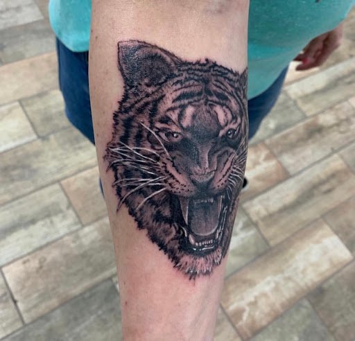 Explore great shoulder tattoo ideas, creative tattoo ideas in Buford, available at Wild Tribe Tattoos and Piercings