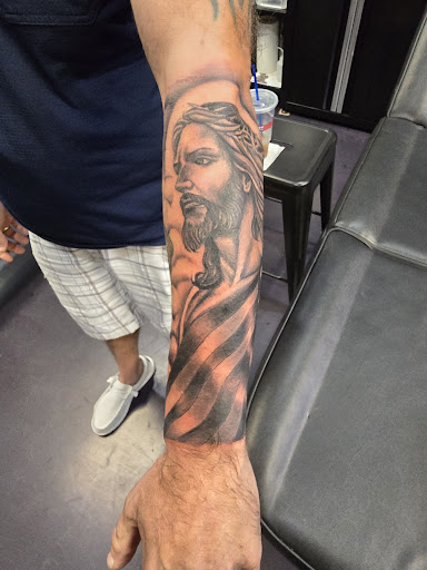 Explore forearm male tattoo ideas, creative tattoo ideas in Florence, available at Til Death Do Us Art Tattoo & Piercing Studio