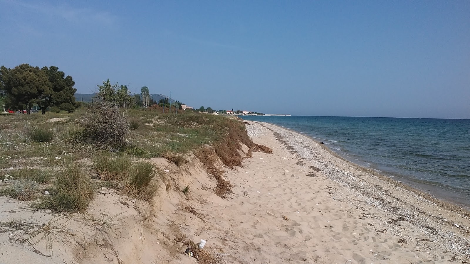 Foto de Orfano beach y el asentamiento