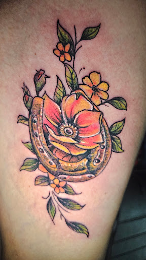 Explore patriotic forearm tattoo ideas, creative tattoo ideas in Angola, available at Hoodlum Ink