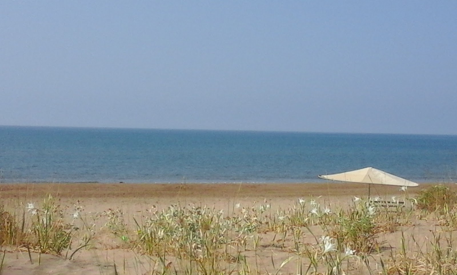 Foto van Letrina beach met gemiddeld niveau van netheid