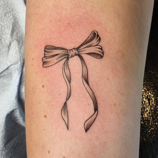 Explore birth flower tattoos ideas, creative tattoo ideas in Pittsburgh, available at Electric Rex Tattoo