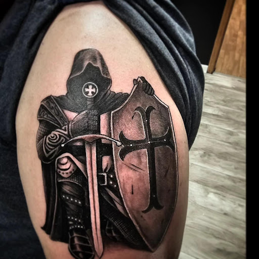 Find in between boob tattoo ideas for your next unique tattoo in Kenosha at Kenosha Tattoo Company