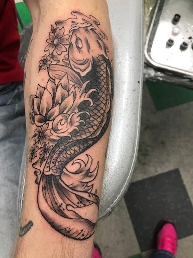 Explore baby yoda tattoo ideas, creative tattoo ideas in Lawton, available at Impact Ink Tattoo Studios