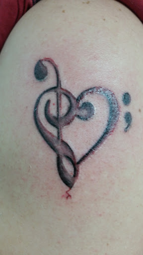 Explore cuff tattoo ideas, creative tattoo ideas in Longview, available at Fugis Tattoo Shop