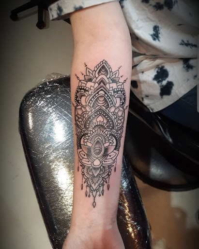 Explore finger tattoo ideas for females, creative tattoo ideas in Rehoboth Beach, available at Tattoo Galaxy (Rehoboth Beach) Piercing & Custom tattoos