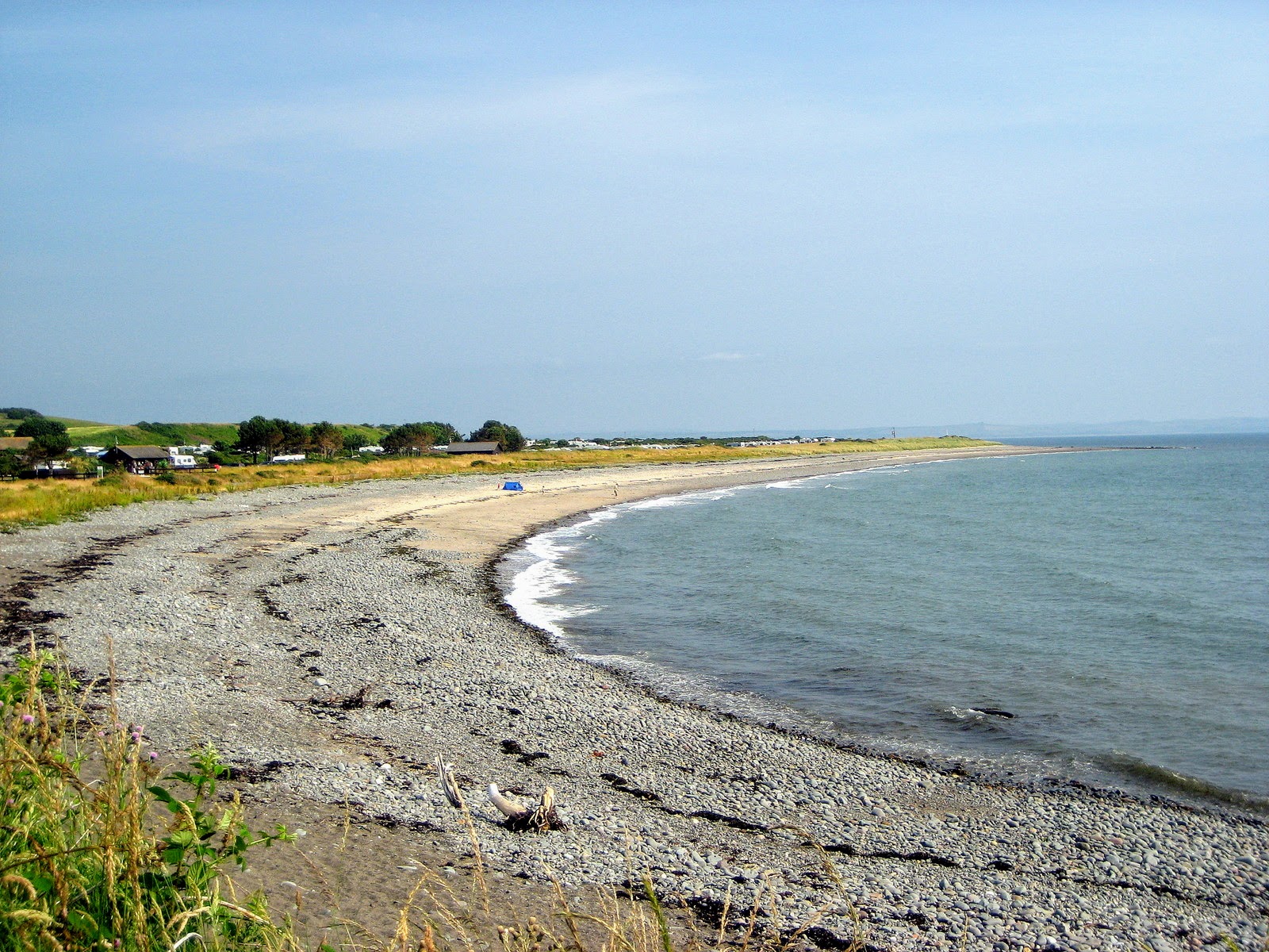 New England Bay Beach的照片 带有宽敞的海岸