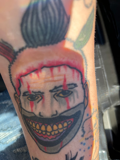 Explore rose tattoo ideas for women, creative tattoo ideas in Newport News, available at American Classic Tattoo