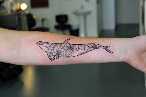 Explore halo game tattoo ideas, creative tattoo ideas in Fort Myers, available at Tiger Lotus Tattoo and Piercing