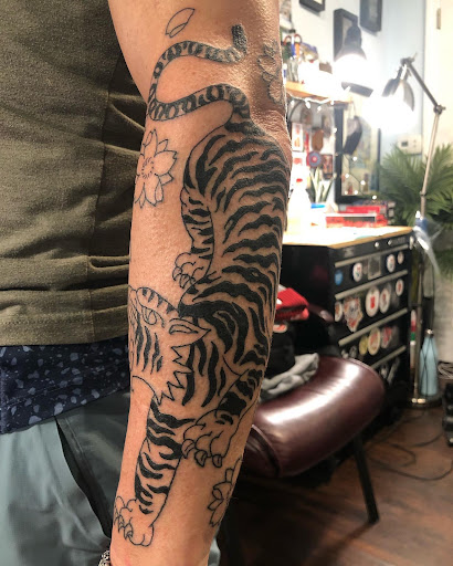 Explore sun tattoo ideas for guys, creative tattoo ideas in Fairfield, available at Three Roses Studio