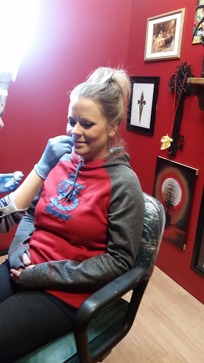 Explore tattoo ideas on lower stomach, creative tattoo ideas in Peoria, available at Sin in Skin Ink