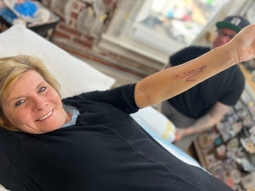 Explore hand name tattoo ideas, creative tattoo ideas in Littleton, available at Think Tank Tattoo South