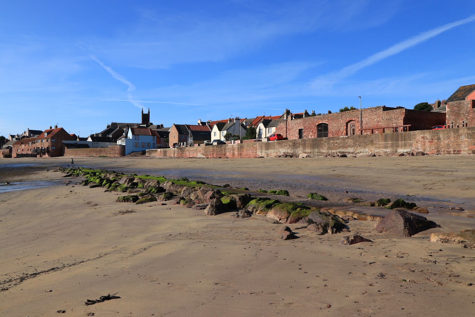 Foto van East Beach en de nederzetting