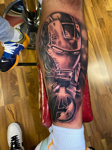 Explore sunset tattoo ideas, creative tattoo ideas in Chicago, available at Shreds Inferno Custom Tattoos