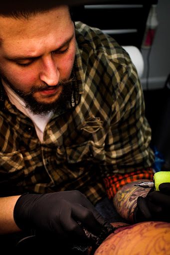 Explore flower foot tattoo ideas, creative tattoo ideas in Mchenry, available at Art and Soul Tattoo Company