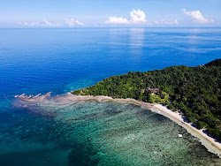 Fotografie cu Rang Bulan Beach - locul popular printre cunoscătorii de relaxare
