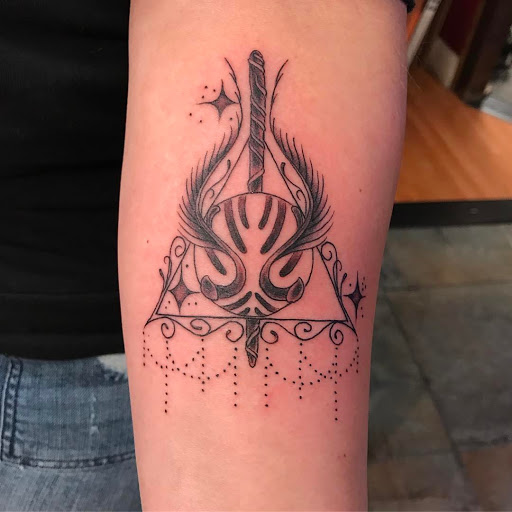 Explore cross tattoo cover up ideas, creative tattoo ideas in Redding, available at The Salty Sloth Tattoo