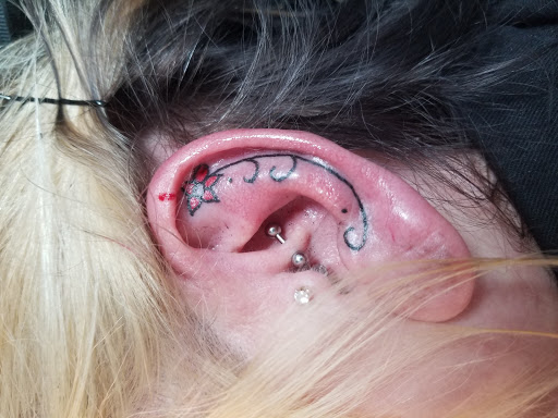 Find double mastectomy tattoo ideas for your next unique tattoo in Arcade at 98 South Tattoo and Piercing
