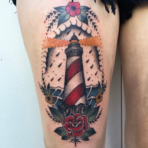 Explore female thigh tattoo ideas, creative tattoo ideas in Fresno, available at Widows Walk Tattoo