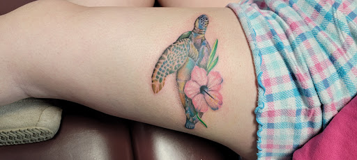 Explore sun tattoo ideas for guys, creative tattoo ideas in Fort Gratiot, available at Stained Glass Tattoo & Body Piercing