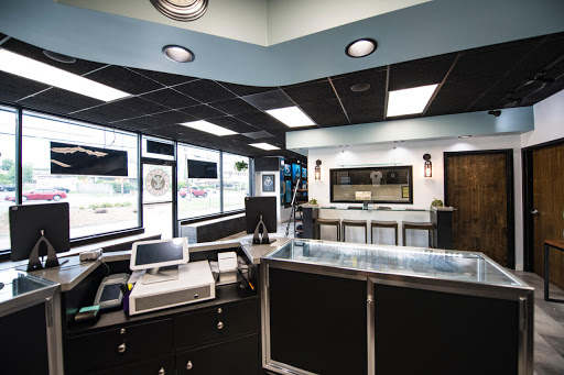 Explore street signs tattoo ideas, creative tattoo ideas in Marietta, available at Sink or Swim Studio and Gallery