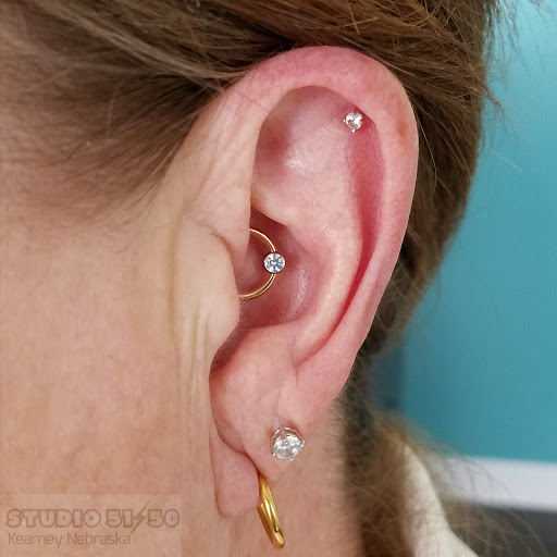 Explore simple sleeve tattoo ideas, creative tattoo ideas in Kearney, available at Studio 5150 Piercing & Fine Jewelry