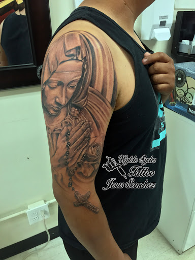 Explore halloween sleeve tattoo ideas, creative tattoo ideas in San Diego, available at Wylde Sydes Tattoo & Body Piercing