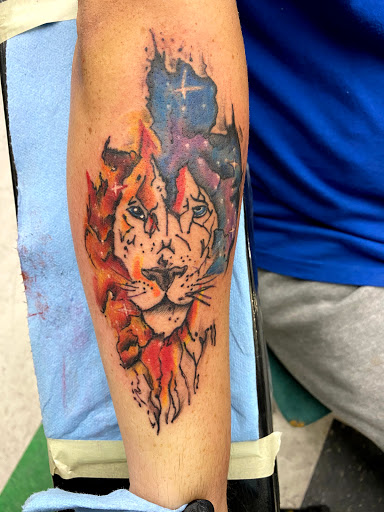 Explore reading tattoo ideas, creative tattoo ideas in Lawton, available at Impact Ink Tattoo Studios