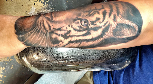 Explore beach themed tattoo ideas, creative tattoo ideas in Pineville, available at Epic Ink Studio