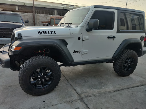 Taller Jeeps Over Six Racing Shop