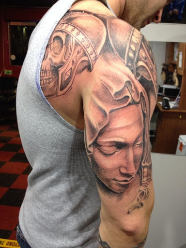 Explore christmas tree tattoo ideas, creative tattoo ideas in Clarksville, available at Uncle Bobs Tattoos