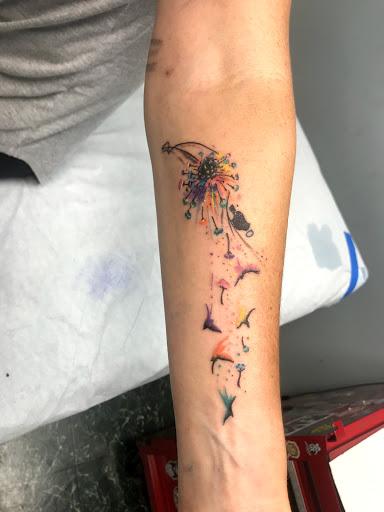 Explore watercolor flower tattoo ideas, creative tattoo ideas in Aurora, available at Ronin Tattoo Studio INC