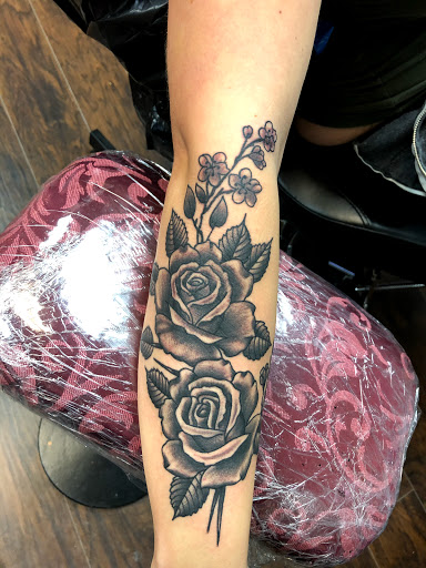 Explore half and half tattoo ideas, creative tattoo ideas in Jacksonville, available at Idle Hands Tattoo Co.