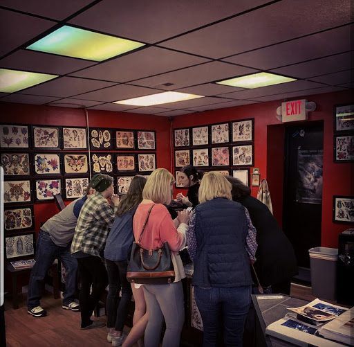 Explore black and red tattoo ideas, creative tattoo ideas in Ambler, available at Tattoo GalaxyAmbler Piercing & Custom Tattoos