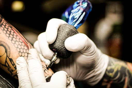 Find tropical flower tattoo ideas for your next unique tattoo in Mchenry at Art and Soul Tattoo Company